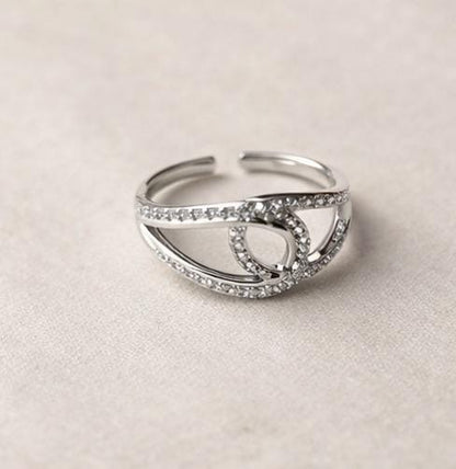 Interlinked stone band ring